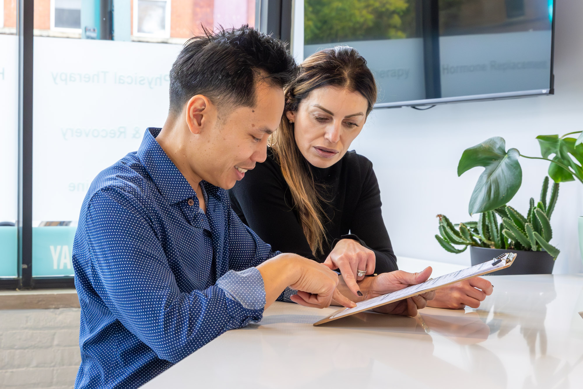 man consults with balance flow staff in chicago about hormone therapy