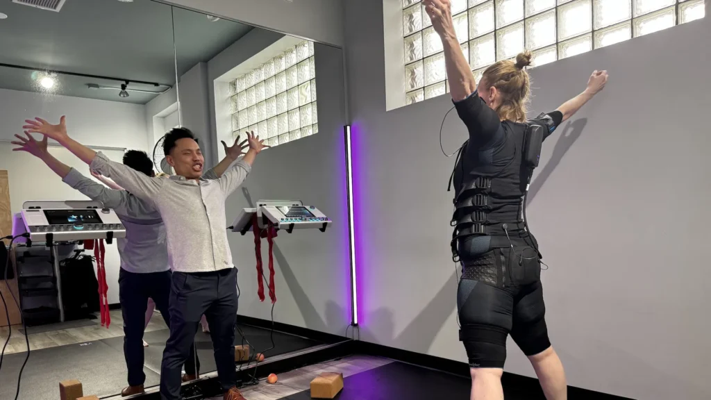 A personal training session for shoulder pain relief in Chicago at Balanced Flow Wellness.